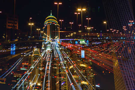 DUBAI, UAE - NOVEMBER 14: Nightlife in Dubai Marina. UAE. November 14, 2012. Dubai was the fastest developing city in the world between 2002 and 2008.のeditorial素材