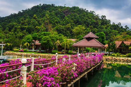 KOH CHANG, THAILAND - 31 MART, 2015: Klong Prao Resort. Cottages on the Bay in a tropical gardenのeditorial素材