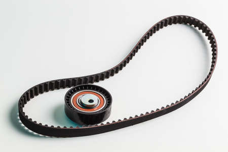 Image of timing belt with rollers on a white backgroundの写真素材
