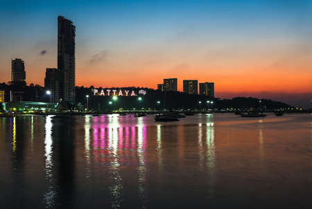 The Pattaya city harbor at twilight, Thailandの写真素材