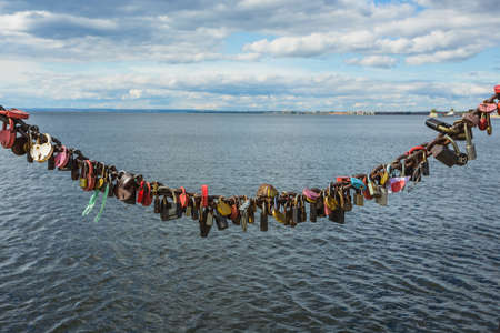 Locked locks of love and loyalty, with the names and dateの写真素材