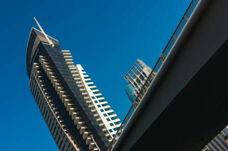 DUBAI, UAE - NOVEMBER 13: High rise buildings and streets nov 13. 2012  in Dubai, UAE. Dubai was the fastest developing city in the world between 2002 and 2008.のeditorial素材