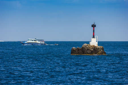 Lighthouse near the island of Phi Phi in Thailandの写真素材