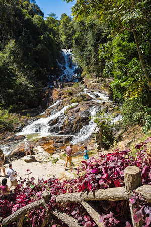 DALAT, VIETNAM - JUNE 14, 2014: Unidentified tourists pose and take pictures in front of Datanla waterfall. It is located 5 km away from the city center.のeditorial素材