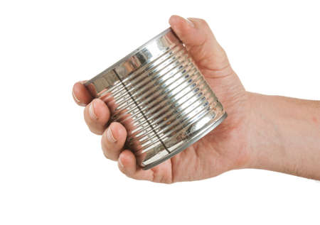 Food can in hand isolated on white backgroundの写真素材