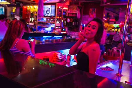 PATTAYA, THAILAND - APRIL 4, 2015: Girls in a night clubのeditorial素材