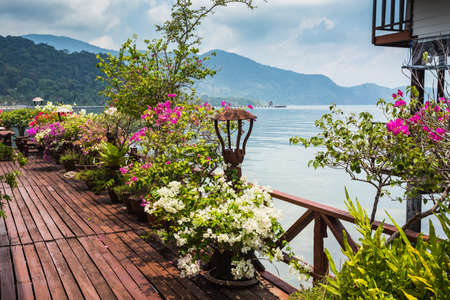 KOH CHANG, THAILAND - APRIL 3, 2015: Cafe on the veranda in the fishing village of Bang Bao tropical island of Koh Changのeditorial素材