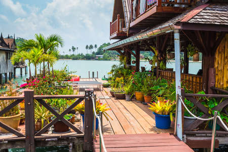 KOH CHANG, THAILAND -  April 3, 2015: Houses on stilts in the fishing village of Bang Baoのeditorial素材
