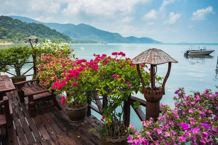 KOH CHANG, THAILAND - APRIL 3, 2015: Cafe on the veranda in the fishing village of Bang Bao tropical island of Koh Changのeditorial素材