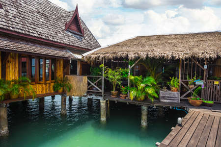 KOH CHANG, THAILAND -  April 3, 2015: Houses on stilts in the fishing village of Bang Baoのeditorial素材