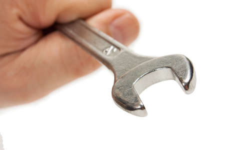 spanner in hand isolated on white background