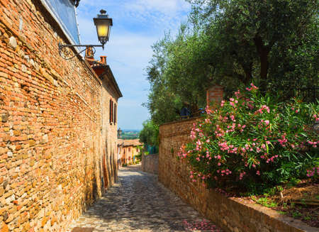 typical Italian street in a small provincial town of Tuscan, Italy, Europe