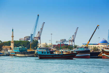 SHARJAH, UAE - OCTOBER 29, 2013: Sharjah - port. Sharjah is located along northern coast of Persian Gulf on Arabian Peninsulaのeditorial素材