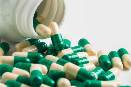 different colored pills in the pack closeupの写真素材