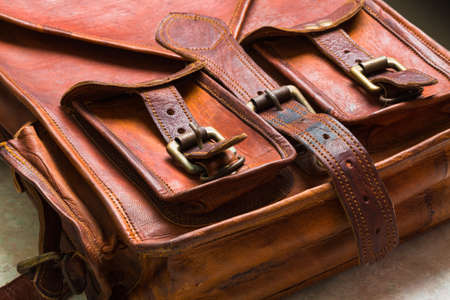 The old bag in leather buffalo with locks closeupの写真素材