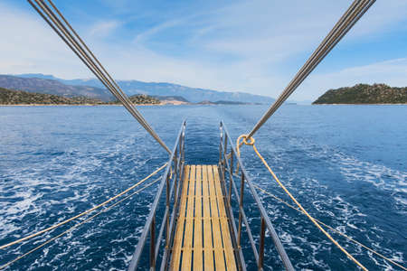 Ship ladder against the sea. Close Up