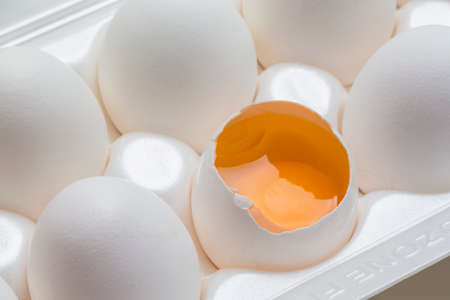 Chicken eggs in the cassette box on a white background