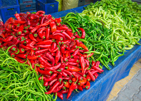 Sale of hot red and green peppers in the markets of Turkeyの写真素材