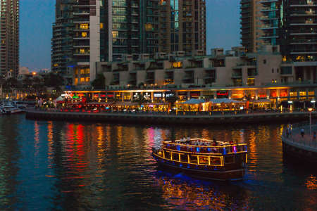 DUBAI, UAE - NOVEMBER 14: Nightlife in Dubai Marina. UAE. November 14, 2012. Dubai was the fastest developing city in the world between 2002 and 2008.のeditorial素材