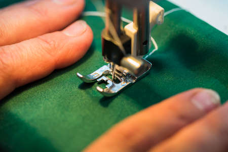 The sewing machine and item of clothingの写真素材