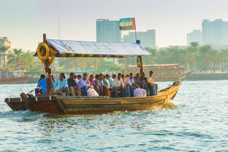 DUBAI, UAE - NOVEMBER 13: Boats on the Bay Creek in Dubai, UAE nov 13 2012. Dubai was the fastest...