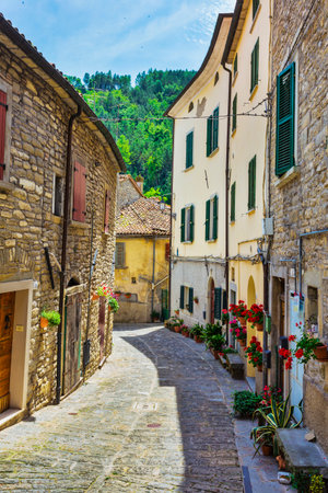 typical Italian street in a small provincial town of Tuscan, Italy, Europeの写真素材