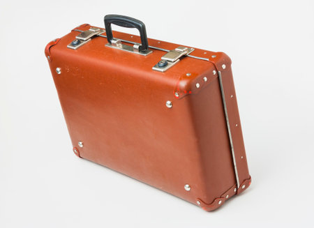 old suitcase isolate on a white backgroundの写真素材