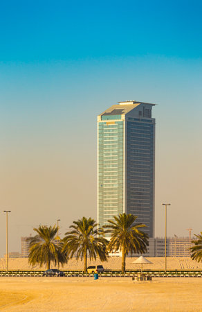 SHARJAH, UAE - NOVEMBER 01, 2013: General view of modern buildings in Sharjah. It is the most industrialized emirate in UAE.のeditorial素材