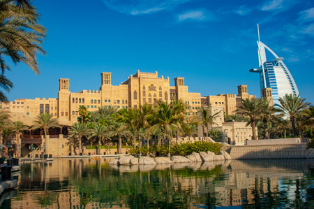 DUBAI, UAE - NOVEMBER 15: View of the hotel Burj Al Arab from Souk Madinat Jumeirah. Nov 15, 2012 in Dubai. Burj Al Arab is a luxury 7 stars hotel built in front of Jumeirah beach.のeditorial素材