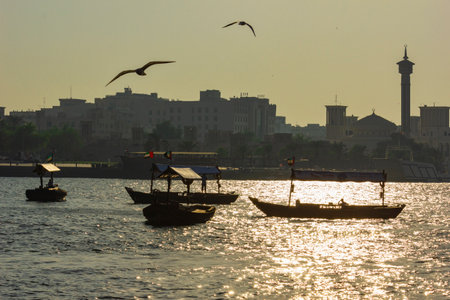 DUBAI, UAE - NOVEMBER 13: Boats on the Bay Creek in Dubai, UAE nov 13 2012. Dubai was the fastest developing city in the world between 2002 and 2008.のeditorial素材