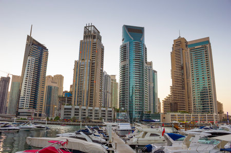 DUBAI, UAE - NOVEMBER 16: Yacht Club in Dubai Marina. UAE. November 16, 2012. Dubai was the fastest developing city in the world between 2002 and 2008.の写真素材