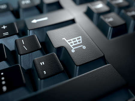 close-up of a keyboard with the enter key replaced with a shopping cart icon. E-commerce conceptの写真素材