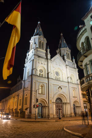 An old church in downtown Cuenca, Ecuador, at nightime の写真素材