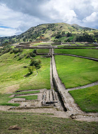 Overall view of the ancient Inca ruins of Ingapirca, Ecuador, on an overcast day の写真素材