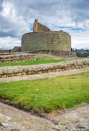 View of the ancient Inca ruins of Ingapirca, Ecuador, on an overcast dayの写真素材