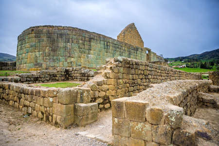 View of the ancient Inca ruins of Ingapirca, Ecuador, on an overcast day の写真素材