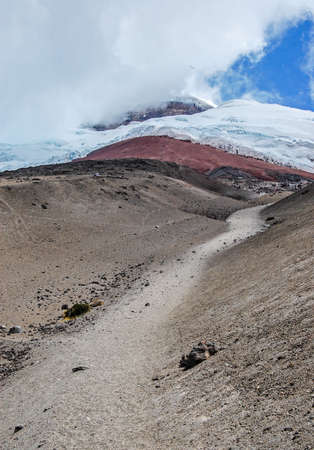View of the majestic Cotopaxi volcano  highest active volcano in the world  on a sunny and cloudy dayの写真素材