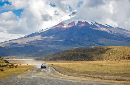 View of the majestic Cotopaxi volcano  highest active volcano in the world  on a sunny and cloudy dayの写真素材