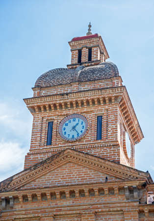 Steeple of an old church made of brick, Ibarra, Ecuadorの写真素材