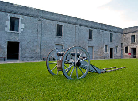 Old canon on wheels in exhibition inside the fort. Castillo de San Marcos, St. Augustine, Florida. 16th centuryのeditorial素材