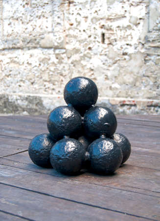 Cannonballs in display inside an old fort in Florida.の写真素材