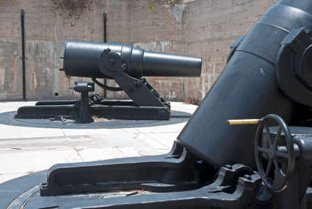Late nineteenth (19th) century iron cannons, in exhibition. Fort De Soto, Floridaの写真素材