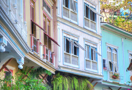 View of the second floor of some old houses and its windows, in Las PeÃ±as neighborhood, Guayaquil, Ecuadorの写真素材