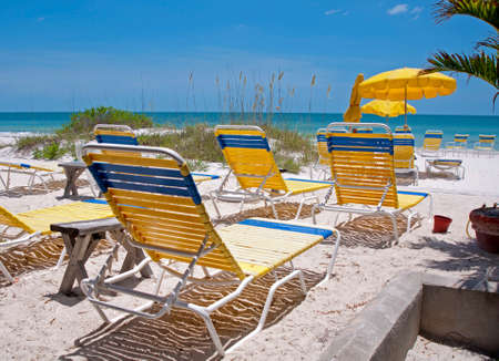 Beach chairs on the beach sand on a sunny morning, Clearwater Beach, Florida, USA.