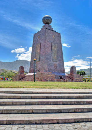 Monument at the Middle of the World, touristic attraction, north of the capital of Ecuador, Quito, on a sunny summer dayのeditorial素材