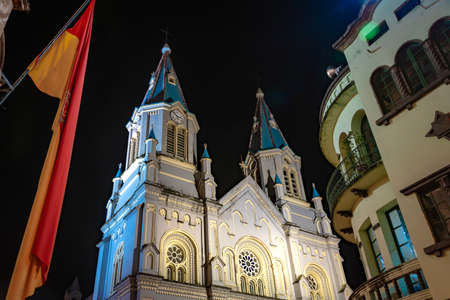 San Alfonso church at night, illuminated, with it's towers and beautiful colors. Cuenca, Ecuador, South America.の写真素材