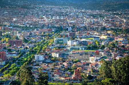 View of the city of Cuenca from the Mirador del Turi lookout, just minutes before sunset. Cuenca, Azuay Province, Ecuador, South America.の写真素材