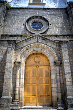 Guaranda, Bolivar province, Ecuador - November 2013: Details of Guaranda's cathedral, on a sunny morning. The landmark is located on the town's central plaza.のeditorial素材
