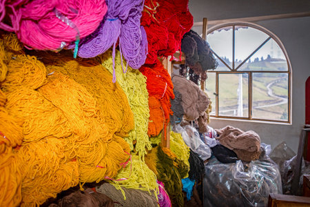 Guaranda, Bolivar, Ecuador - November, 2013: Wool and other textile fabrics storage area, on shelves, in a local small and humble manufacturer shop.のeditorial素材