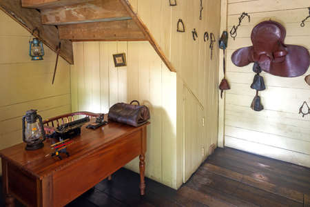 Guayaquil, Guayas, Ecuador - November, 2013: Replica of a farm office with horse riding decorations, at the Parque Nacional (National Park).のeditorial素材
